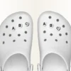 Liten «Friendship Letter C» Jibbitz™-charm